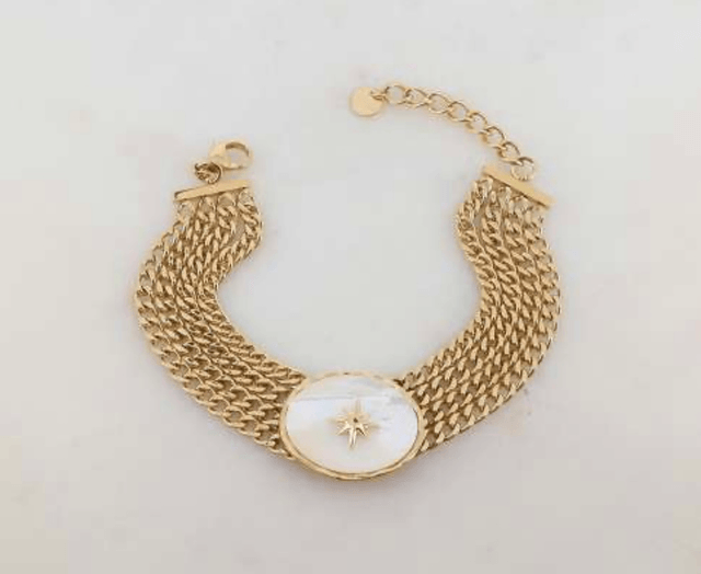Bracelet en maille gourmette 4 rangs avec pièce ovale, nacre et étoile gravée